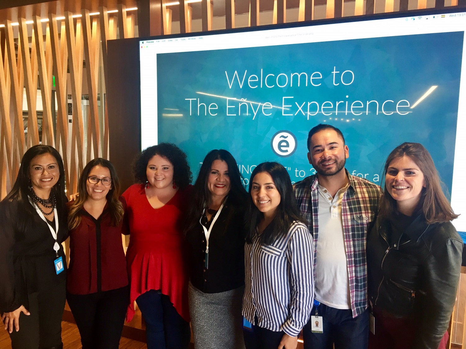 Denise Soler Cox with members of the Salesforce Latino ERG after a keynote, standing together and smiling.